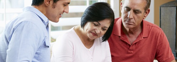 Financial Advisor Talking To Senior Couple