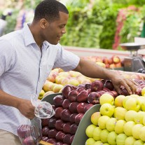 Man shopping in produce section