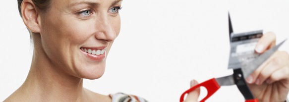 Woman Cutting up Credit Card