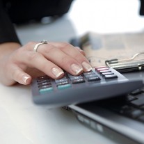 Businesswoman calculating